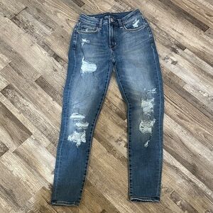 Distressed Blue Jeans